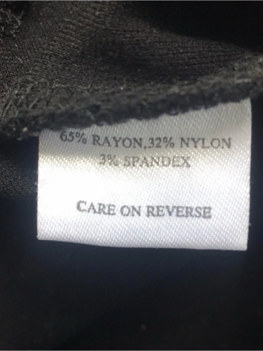 CHANEL black quilted boatneck employee uniform top